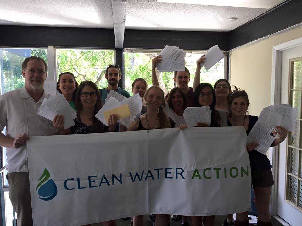 2015 Texas staff posing with letters to EPA and Clean Water Action banner
