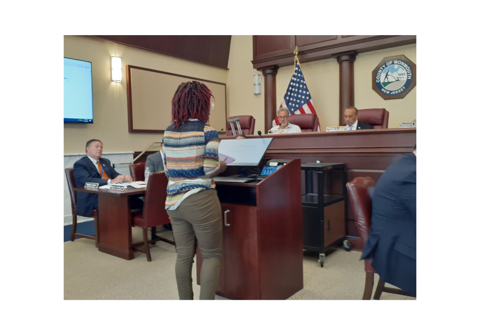 Image of Clean Water Action's Warehouse Organizer Tolani Taylor testifying in NJ