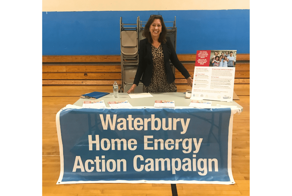 Image of Anne Hulick, Clean Water Action State Director tabling for Waterbury Home Energy Action Campaign