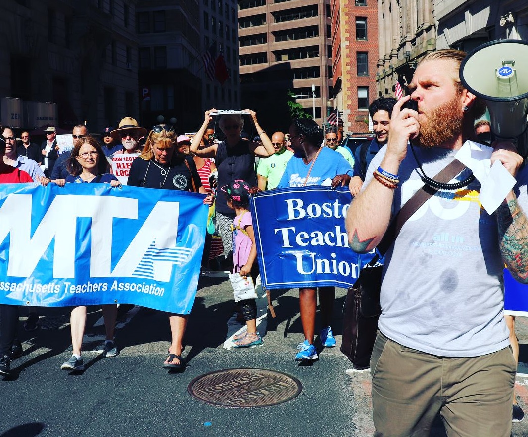 Jeremy Shenk (with megaphone) at a march