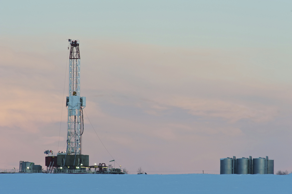 Drilling Rig at Dawn. Photo credit: tbob / iStock