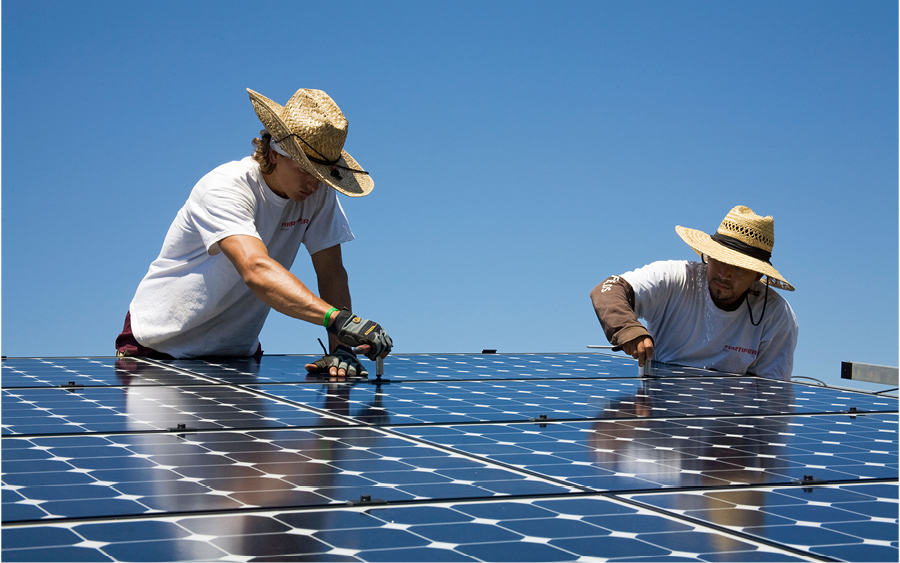 Solar workers installing panels