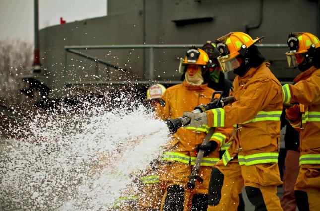 Image of Firefighters with foam.