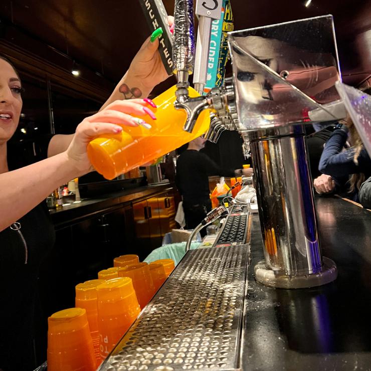 The Fillmore pouring drinks into reusable glasses
