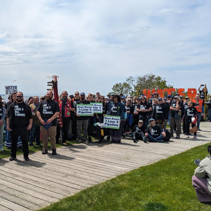 Group with Shut Down Line 5 t-shirts on Mackinac Island 