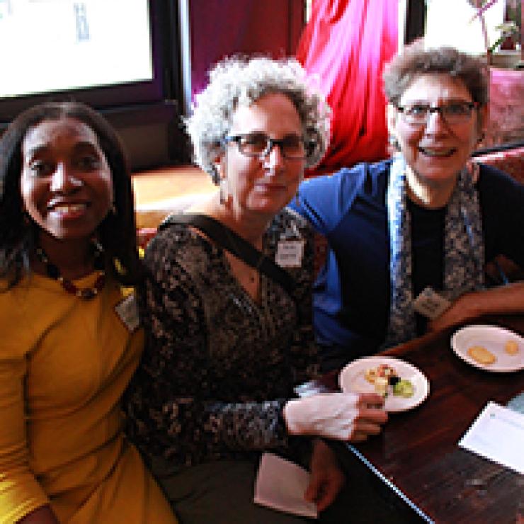 Lilly Marcelin of Resilient Sisterhood Project, Marla Cummins, and Clean Water Action Advisory Board Member Ellie Goldberg enjoy some delicious hors d’ouevres. 