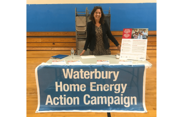 Image of Anne Hulick, Clean Water Action State Director tabling for Waterbury Home Energy Action Campaign