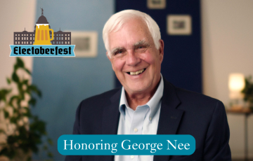 Image of George Nee being honored at Clean Water Action Electoberfest