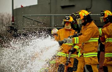 Image of Firefighters with foam.