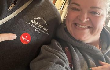 Posing with "I Voted" stickers