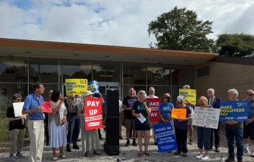 Amy Goldsmith speaking at a rally to urge passage of NJ Climate Superfund