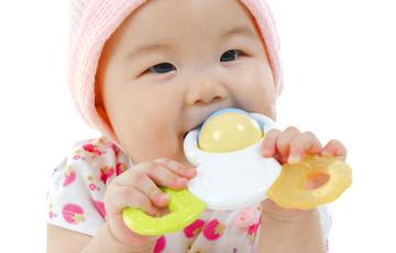 Toxics_baby_with_toy_istock-000020745937_Large.jpg