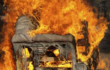 Couch on fire. Photo credit: Timothy Epp / Shutterstock