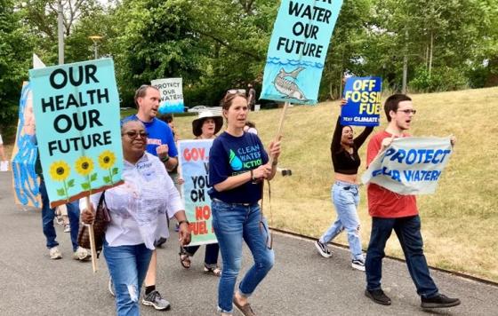 Image of Clean Water Action and Empower NJ staff members at a rally for climate