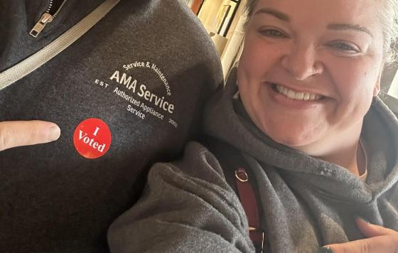 Posing with "I Voted" stickers