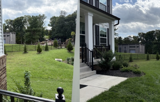 Pictures sideways across the front of a house, with industrial buildings behind a fence in the near background