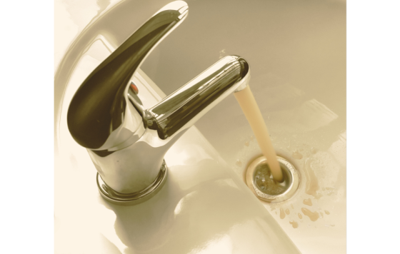 Image of dirty brown tap water