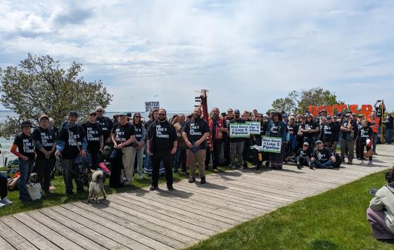 Group with Shut Down Line 5 t-shirts on Mackinac Island 