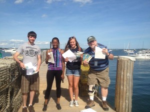 Dave (r) and crew with letters from Clean Water Action members to EPA (on Narragansett Bay, in Jamestown, RI)
